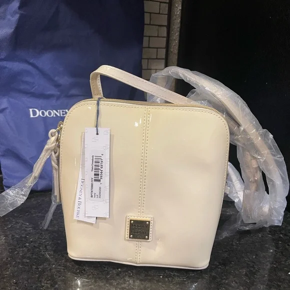 Dooney & Bourke Ivory Crossbody Bag - Picture 1 of 9
